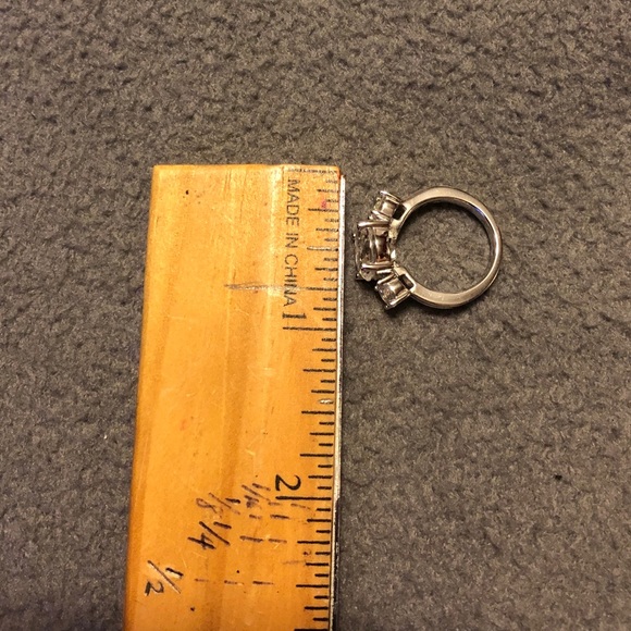 CZ 3 stone ring mounted on silver tone setting. - Picture 6 of 8